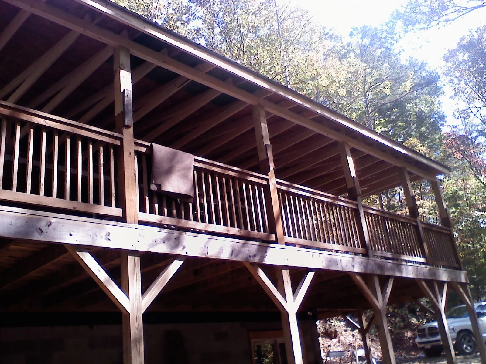 Timber framing under a new elevated porch and deck — Roof Leak Repair in Blain by Roofing Brothers